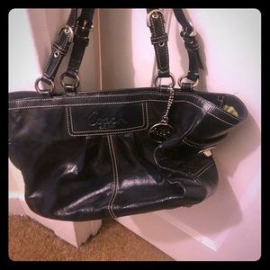 dark blue coach purse